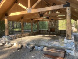 Artisan Outdoor Living Comprehensive outdoor stone living area with gazebo, fireplace, and patio in the Methow Valley.