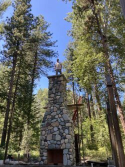 The Artisan Hearth Full-scale river rock fireplace construction in the Methow Valley.